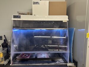 A photo of the Sentry Air Systems spray booth in the Instrument Shop.