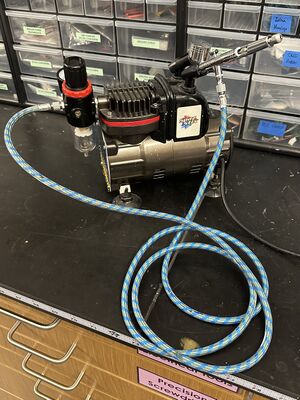 A photo of the Spaz Stix airbrush in the Makerspace.